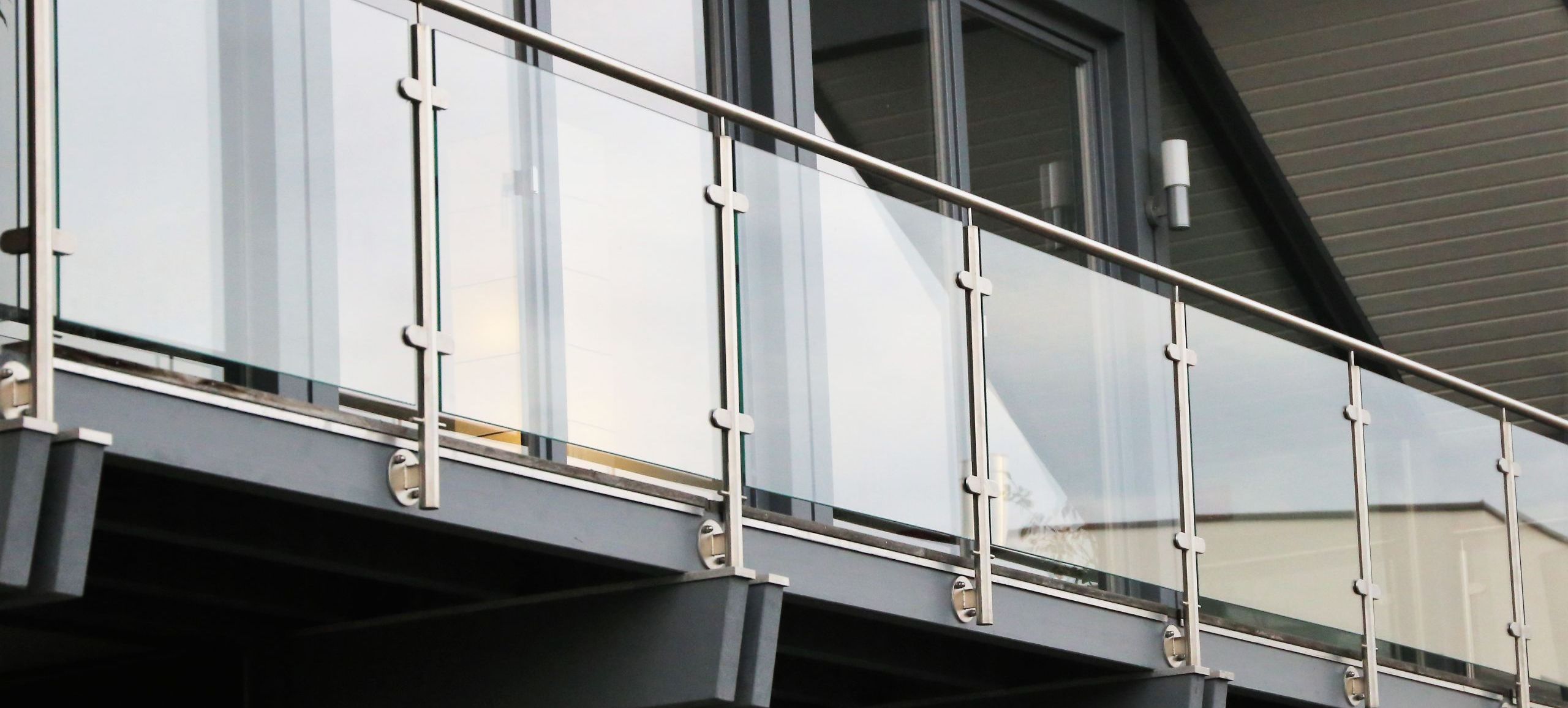 Balcony railing made of glass and stainless steel